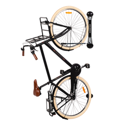 A black Steadyrack Classic Fender Bike Rack holding a bike with fenders.